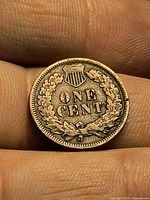 Reverse showing ONE CENT within oak wreath and shield