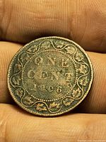 Reverse of 1906 Canadian large cent showing ONE CENT 1906 and maple wreath