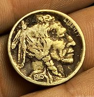 Obverse showing 1915 date and worn Native American profile