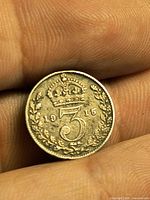 Reverse showing crowned 3, wreath, date 1915