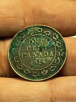 Reverse showing ONE CENT CANADA 1916 within wreath