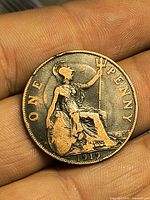 Reverse of the 1919 One Penny showing Britannia design, date and toning