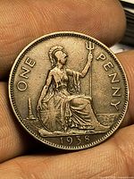 Reverse of 1938 UK one penny showing Britannia and date