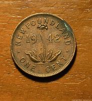 Reverse side showing 1942 date and floral sprig design