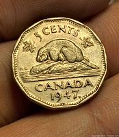 Reverse showing beaver, denomination, maple leaf, date 1947