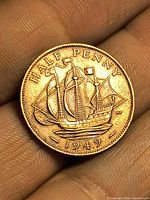 Reverse of 1949 half penny showing HMS Golden Hind and date