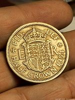 Reverse showing crowned shield, denomination and date