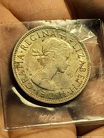 Obverse of 1962 English Half Crown in plastic sleeve showing Queen Elizabeth II portrait