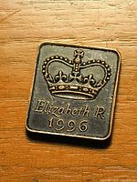 Obverse side showing crown, "Elizabeth R 1996" text