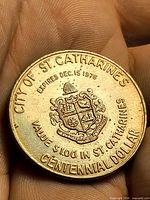 Obverse showing text, coat of arms, condition