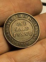 Reverse side showing COMMONWEALTH OF AUSTRALIA ONE HALF PENNY 1919