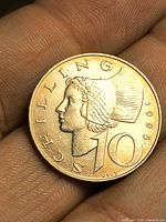 Obverse showing female bust and denomination