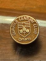Front view showing Quarter Century Club Ontario design