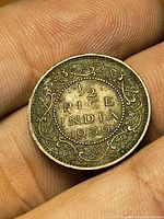 Reverse side showing "1/2 Pice India 1939" within wreath