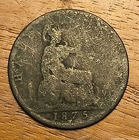 Reverse of 1875 penny with seated Britannia and date