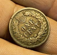 Reverse of 1906 Indian Head Cent showing ONE CENT wreath