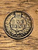 Reverse of 1907 Indian Head cent showing ONE CENT within wreath