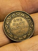 Reverse of 1912 Canadian large cent showing denomination and date