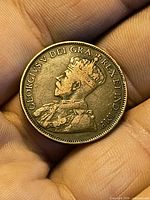 Obverse showing King George V portrait and legend GEORGIVS V DEI GRA REX ET IND IMP