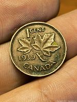 Reverse of 1939 Canadian 1-cent showing date, denomination, maple leaf design