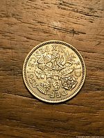 Reverse showing floral emblems and date 1953