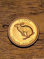 Reverse showing rabbit design, denomination and years