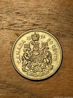 Reverse showing Canadian coat of arms, CANADA 1974 50 CENTS inscription