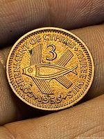 Reverse showing fish design, denomination and date