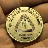 Obverse showing 60 Years of Human Service design