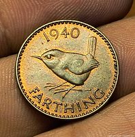 Reverse showing 1940 date and wren bird design