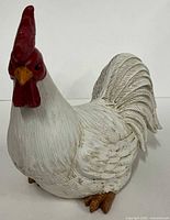 Front/side view of resin rooster figurine