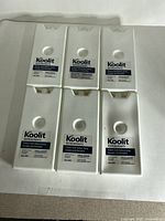 Front view of six Koolit ice packs grouped together