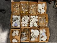 Top view of nine carton sections filled with assorted loose bulbs