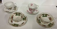 Group shot of four teacup and saucer sets