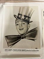 James Cagney portrait photo with hat and bowtie, Yankee Doodle Dandy caption visible