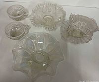 Group view showing two cups and three bowls