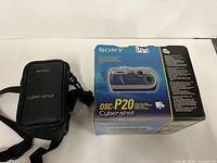 Camera bag and retail box