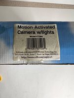 Box label showing Motion Activated Camera w/lights Model VT38A