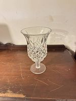 Flared vase on pedestal showing overall shape and pattern