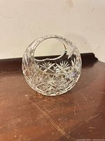 Front view of cut crystal spherical vase