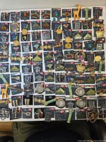 Full overview of all Axcess carded brooches and pins spread out