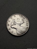 Reverse showing caribou design, denomination and date