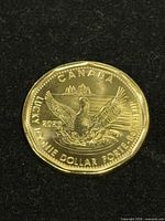 Reverse of 2026 Lucky Loonie coin showing loon design and CANADA legend