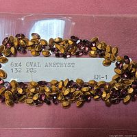 Packaged rhinestones showing label 6x4 oval amethyst 132 pcs