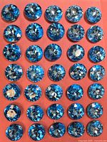 All gems laid out in rows showing quantity and color