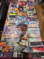 Tabletop view showing entire spread of comic books