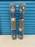 Two rolls Select plastic hardware cloth standing upright
