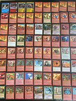 Overview grid showing majority of red old-border MTG cards laid out