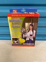 Front of boxed magnetic door screen curtain