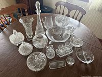 overview of all glass and crystal pieces on table